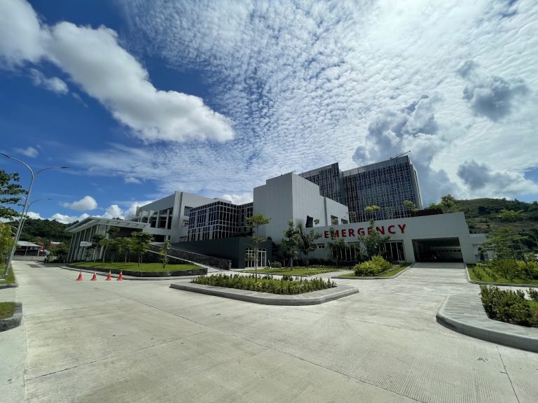 Modern hospital building with an emergency entrance.