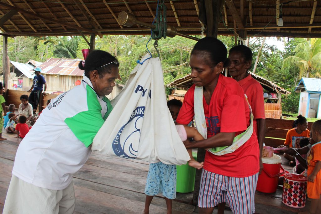 Targeted anti-stunting programs and nutrition support for children in Papua.