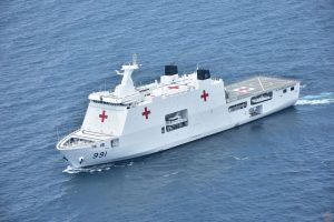 White Indonesian Navy hospital ship with red crosses and the hull number 991 sailing at sea