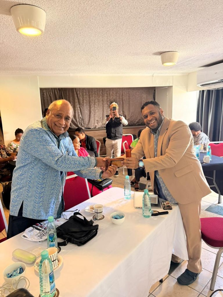 Indigenous Papuan scholars and Vanuatu civic delegates exchanging documents during the Papua Movement forum